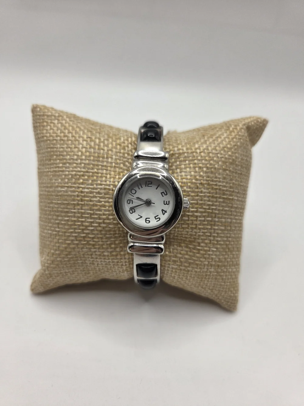 1565. Classic Silver Tone & Black Clamper Bracelet Watch